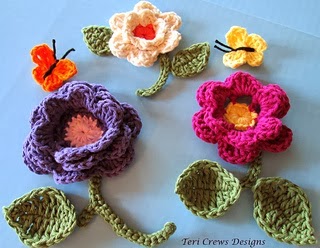 http://www.ravelry.com/patterns/library/flowers-and-butterflies-crochet-pattern