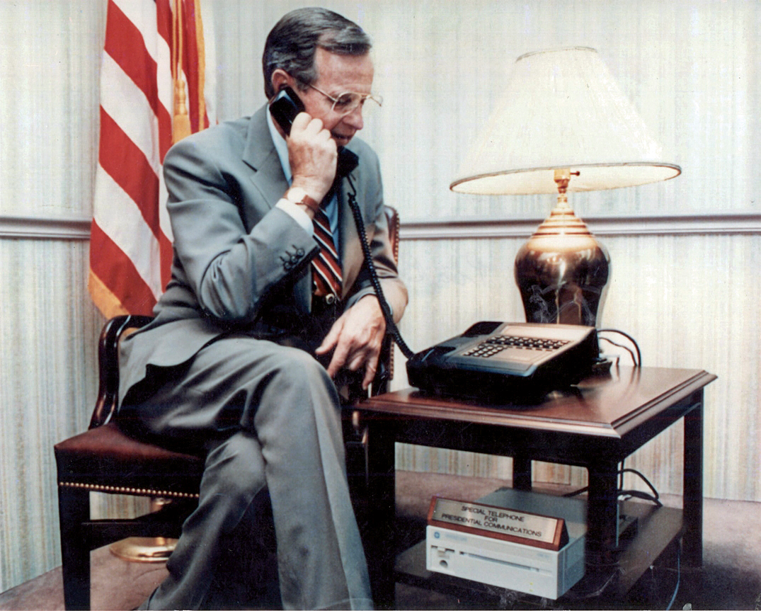 President George H.W. Bush using a secure Motorola STU-III telephone