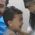 Father cries more than his crying child while being vaccinated in the hospital