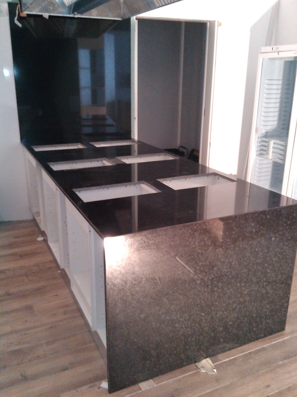 RJ MARBRE . CREAMOS TU CONFORT .(VALENCIA): Cocina con isla central