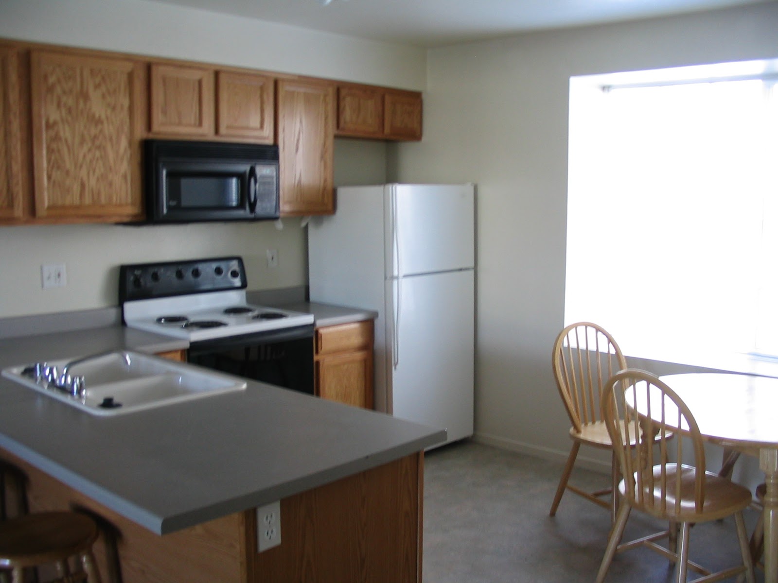 College Courtyard Apartments Our kitchens include range and oven