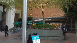 A Starbucks Coffee Shop in a Courtyard