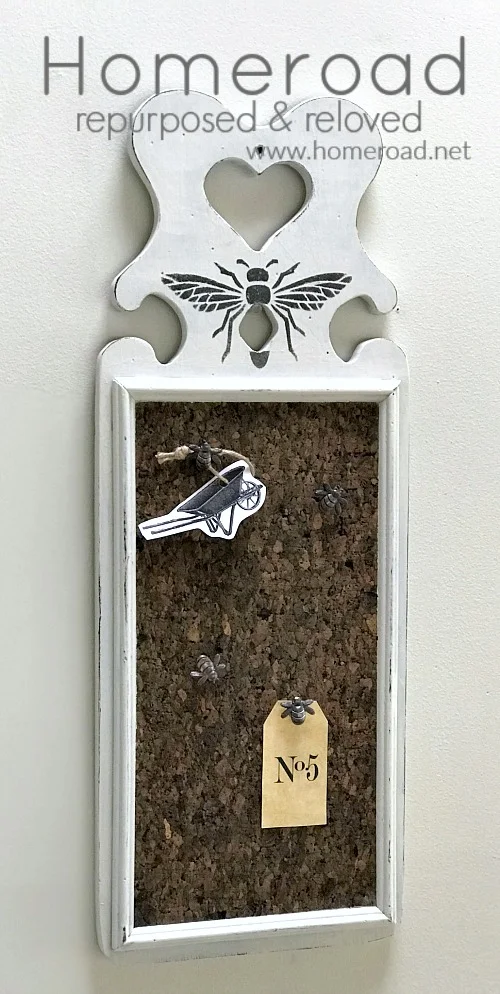 Bee stenciled cork board with bee thumb tacks.