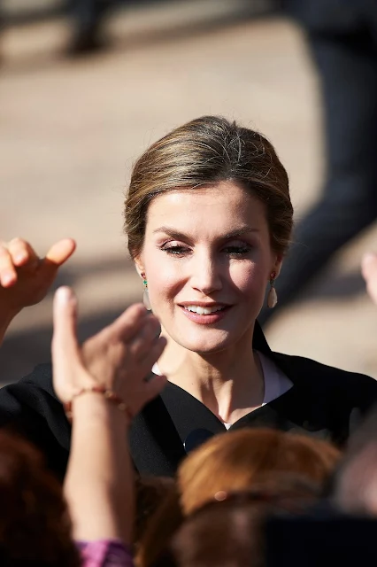 Queen Letizia visits City Hall and House of Culture of Villanueva de los Infantes. Queen Letizia wore Zara Coat and Magrit Sandals.