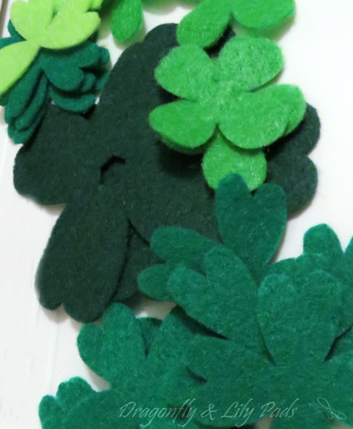 Four shades of green, four shapes of shamrocks cut on Cricut Maker