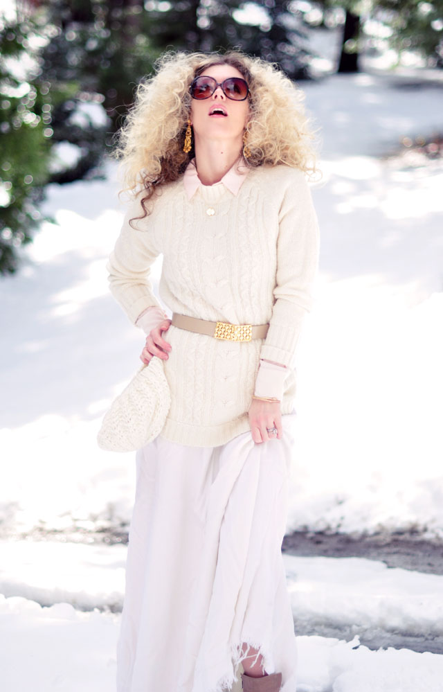 big blonde afro curls, light neutrals in the snow, winter style