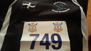 Race number pinned to runners bib