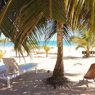 Remaxvipbelize: Beach chairs, beachfront--between cabanas and Sea