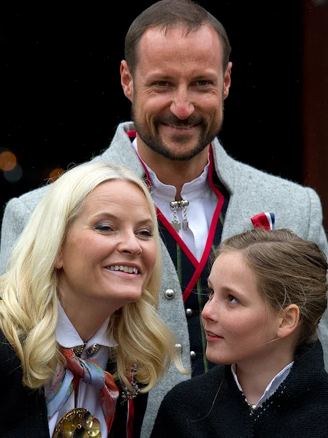 King Harald and Queen Sonja, Crown Prince Haakon of Norway and Crown Princess Mette-Marit of Norway with Princess Ingrid Alexandra, Prince Sverre Magnus and Marius Borg Høiby greet the Childrens Parade on the Skaugum Estate 