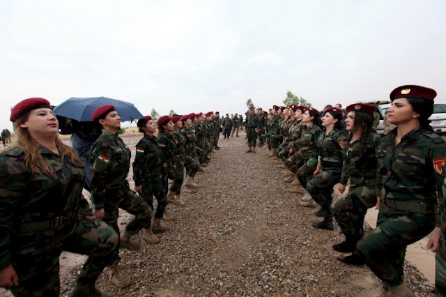 Kurdistan Peshmerga Kurdish Women Fighter ready to fight ISIS terrorists fighting terrorism for freedom
