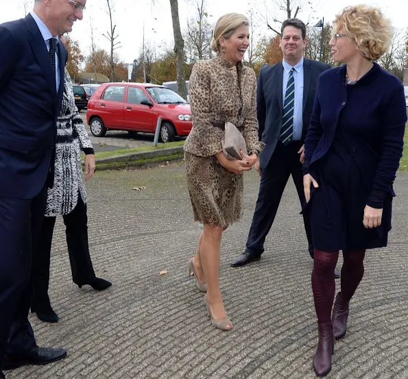 Queen Máxima visits Roessing Research and Development Centre in Enschede. Queen Maxima wore Natan Leopard Dress