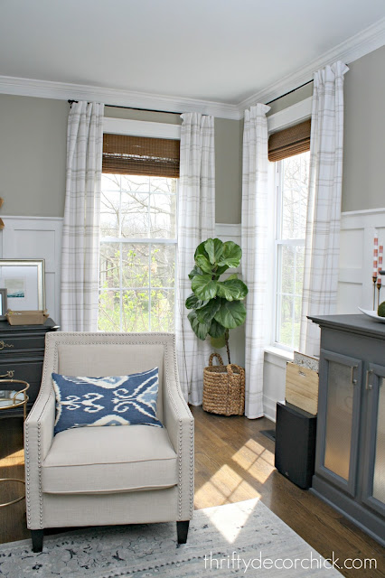 Corner windows with tall drapes