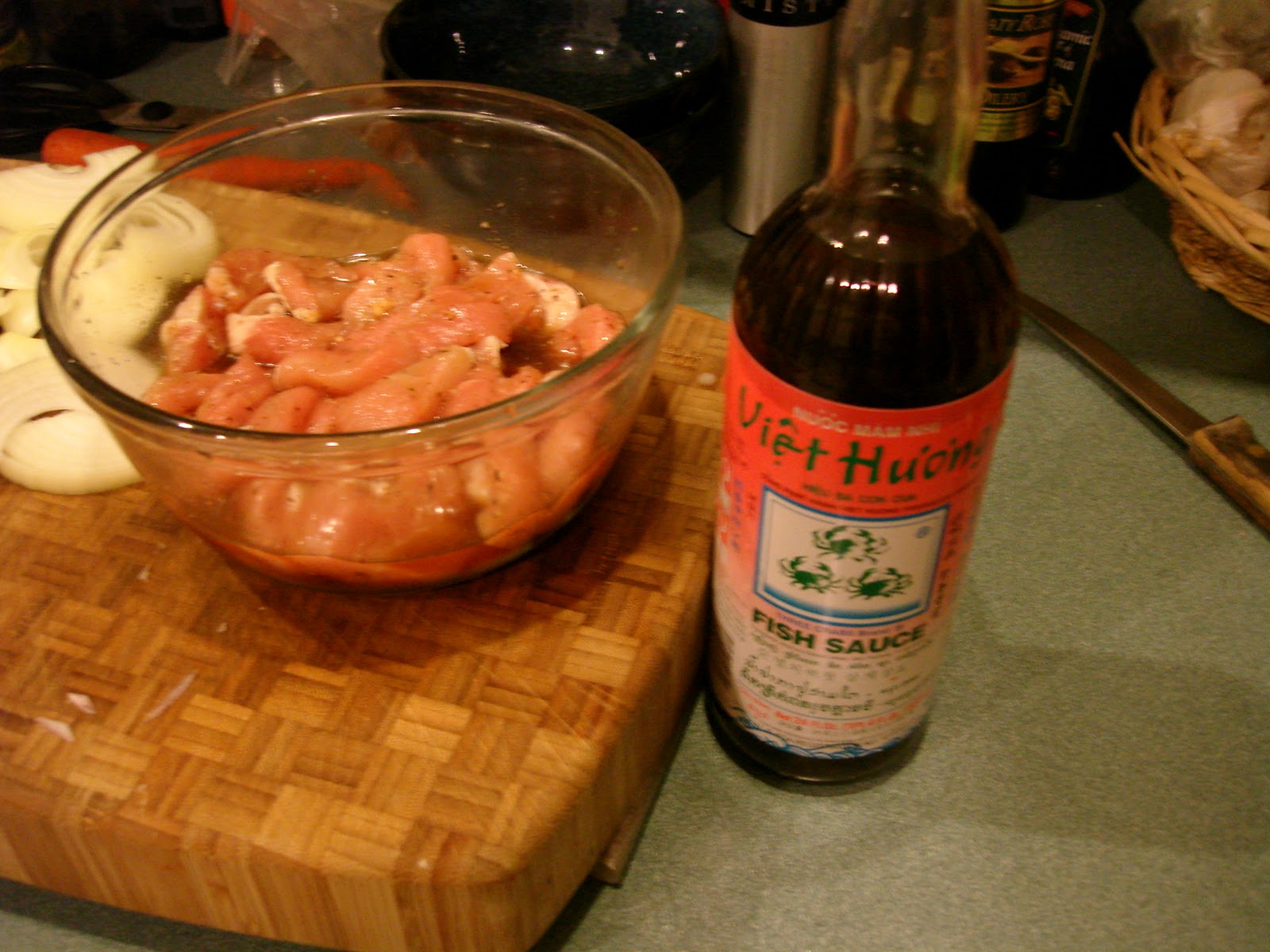 Cleaver Chops Vietnamese pork in a clay pot