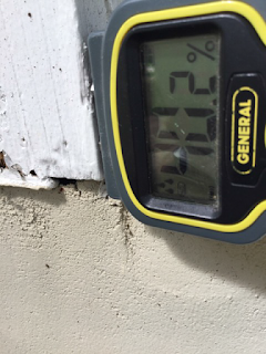 Elevated moisture levels detected on siding during a home inspection in Daytona Beach, 1homeinspector.com (386) 624-3893 Best Home Inspection in Daytona Beach, Daytona Beach Home Inspector, 