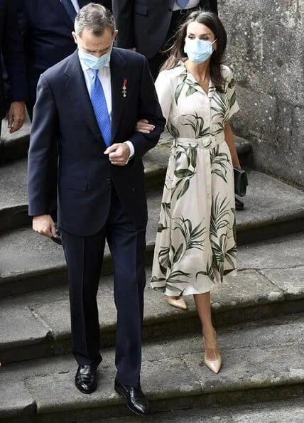 Queen Letizia wore a new printed shirt dress from Pedro del Hierro, and nude patent leather slingback pumps from Carolina Herrera