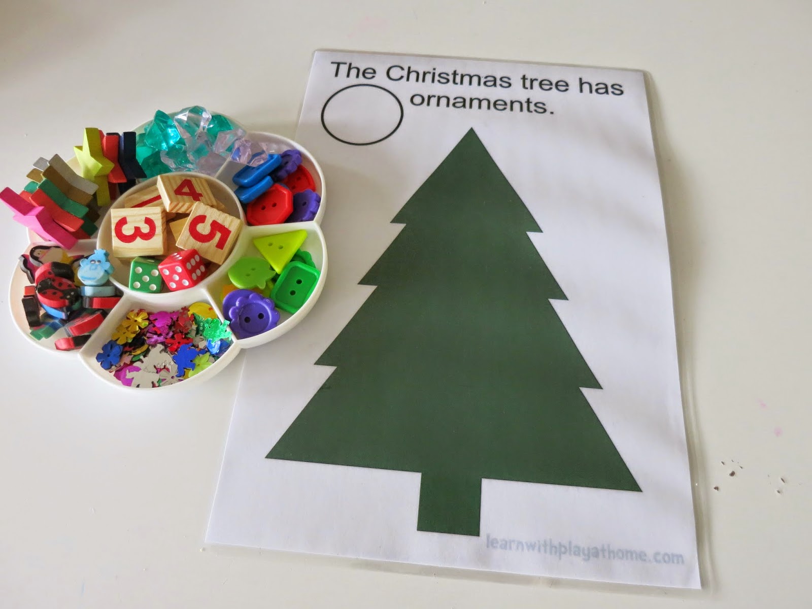 Learn with Play at Home Christmas Tree Play Mat. Free Printable