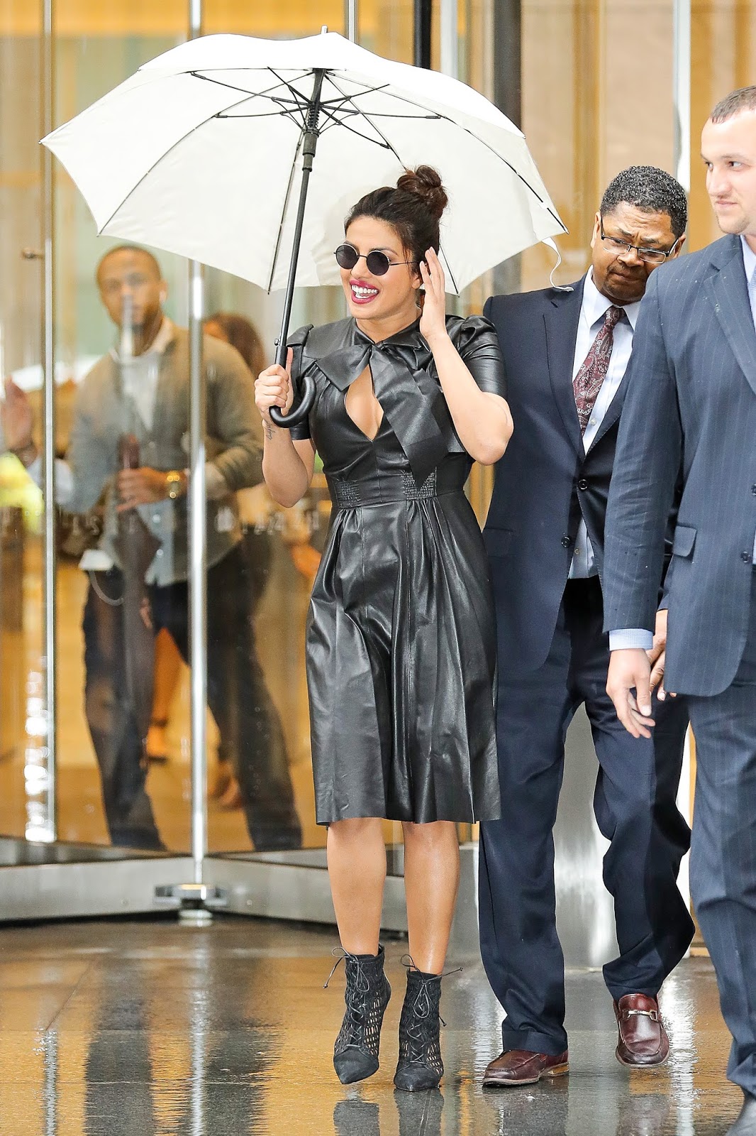 Priyanka Chopra Displayed Her Sexy Cleavage in a Black Leather Dress as She Was Out on a Rainy Day in New York City