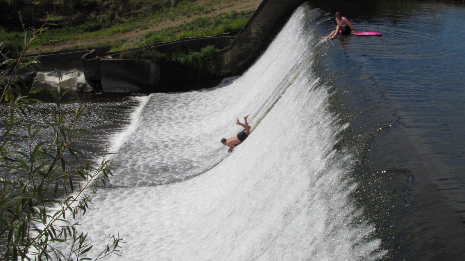photographing New Zealand normanby dam dropping and swimming