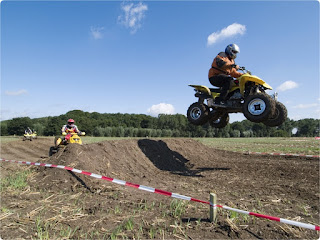 Quad Bike Racing Quad Bike Jumping Over a hump