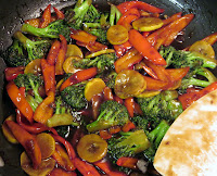 stir-frying peppers broccoli & squash