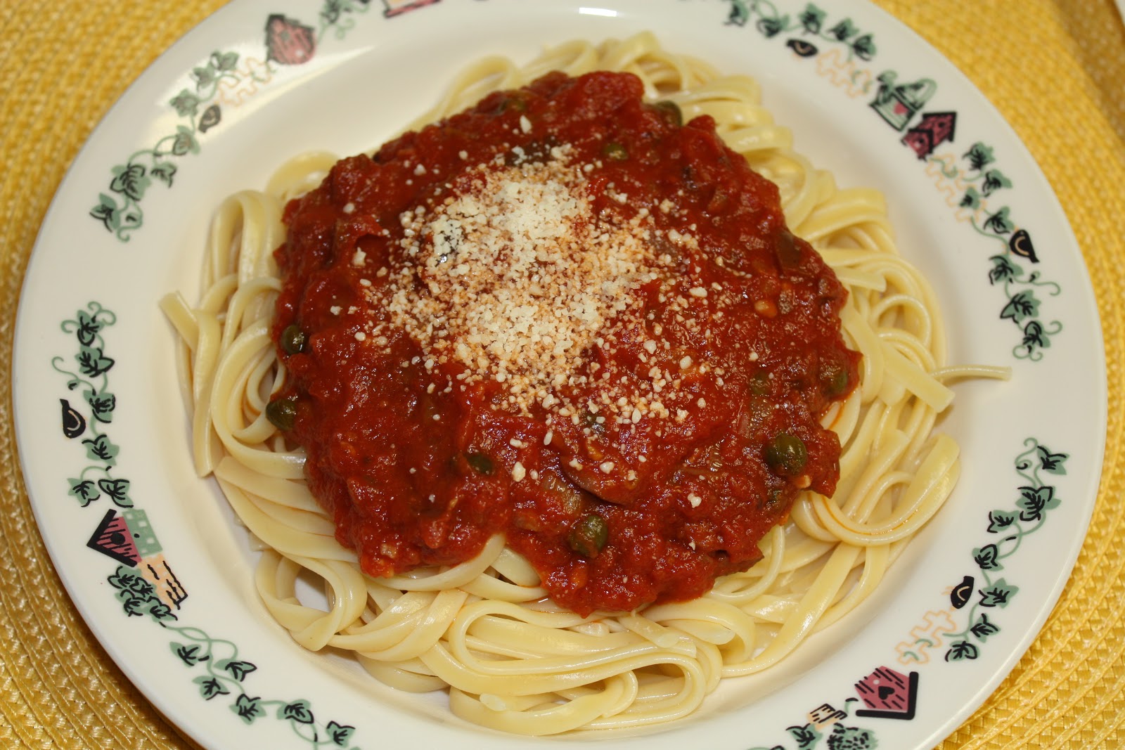 Cheese with Noodles Olive and Caper Tomato Sauce