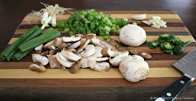 Easy Pork Ramen - A rich broth with noodles, mushrooms, greens, scallions, thinly sliced pork and egg. #ramen #noodles #soup