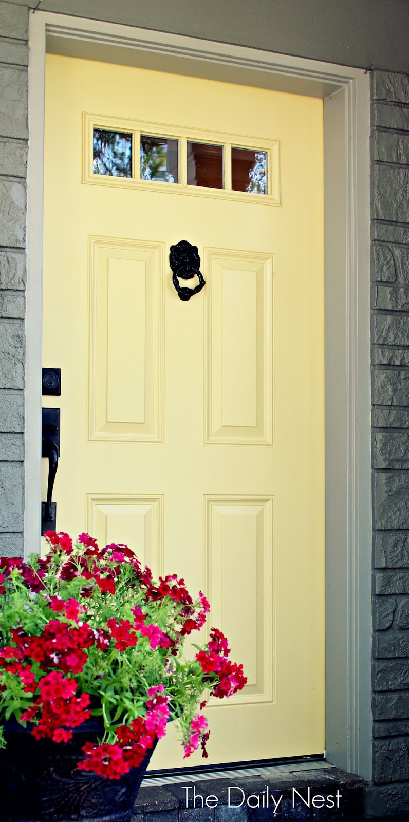 Spring-ifying My Front Porch With A Yellow Door
