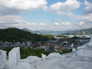 View from "The Heights of Eternal Hope for the Future" over Setoda, the Seto sea, islands and mountins with marble in the foreground