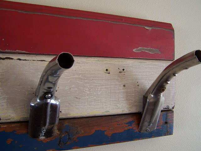 repurposed coat hook from oil can nozzles http://bec4-beyondthepicketfence.blogspot.com/2011/05/patriotic-coat-hook-its-gas.html