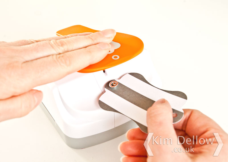 Set the eyelet with the Fiskars 3 in 1 Tag maker