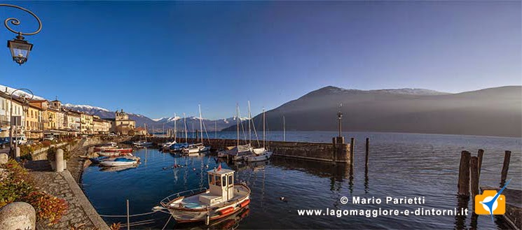 Cannobio, il porto e la costa varesotta del lago maggiore Cannobio, il porto e la costa varesotta del lago maggiore