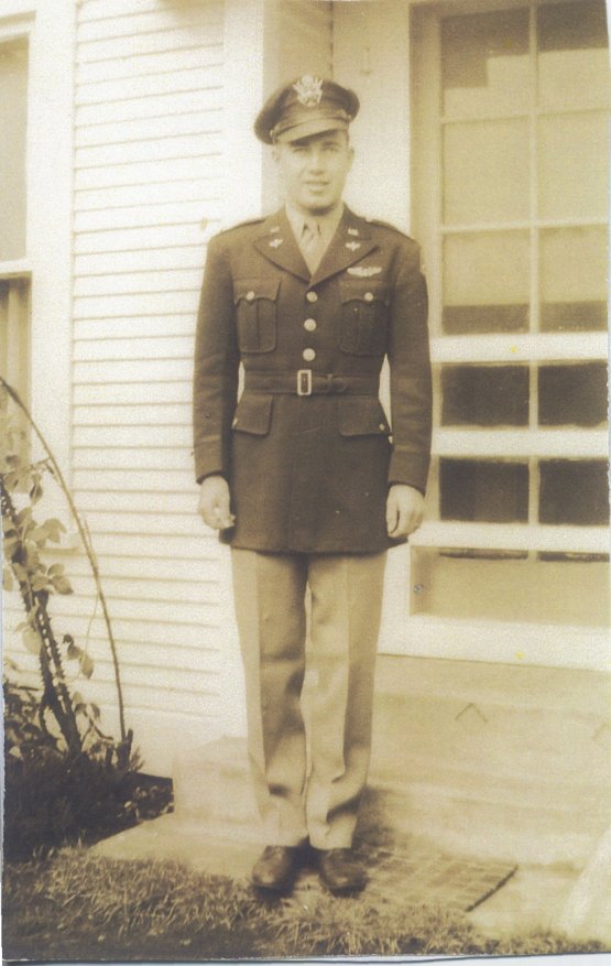 ZELMAR - STANDING IN FRONT OF HIS PARENT'S HOUSE IN HIS USAAC WWII UNIFORM PICTURE TAKEN IN 1943