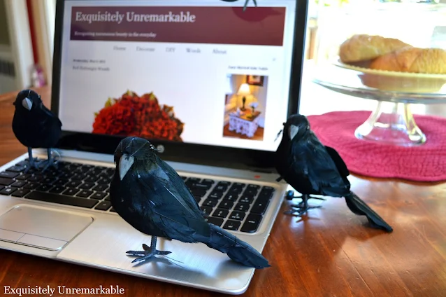Faux Black Birds on a laptop