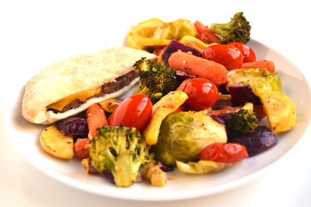 Rainbow Roasted Vegetables are simple to make and customizable with your choice of different red, orange, yellow, green and purple vegetables and 4 spice blends for the perfect side dish! www.nutritionistreviews.com
