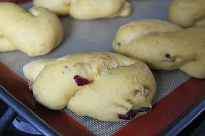 Shaped dough for pumpkin-cranberry-pecan twists