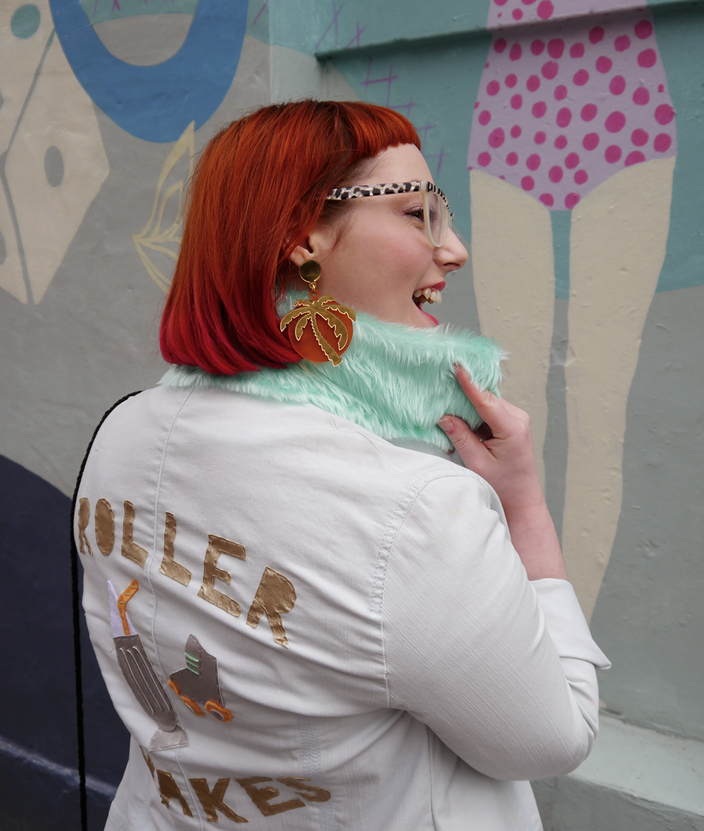 Faux Leather and Fur Cusomised Roller Shakes Denim Jacket Styled by Helen, Wardrobe Conversations, Scottish Blogger, Edinburgh Blogger, Dundee Blogger, red head, ginger bob, Spex Pistols glasses, leopard print glasses, customised denim jacket, mint fur collar, Monki prints, Monki tshirt, Monki x Lynnie Zulu, Lynnie Zulu for Monki, River Island white lace up shoes, Rockcakes brooch, Rock Cakes pin badges, personalised denim jacket, Lucky Dip pins, milkshake with sprinkles, Roller Shakes, Blog Birthday, Style Diner, Kate George Mural Edinburgh, wall art Edinburgh, Edinburgh South side, Lou Taylor, tropical earrings, skinny dip london milk bag, novelty bag, milk bag
