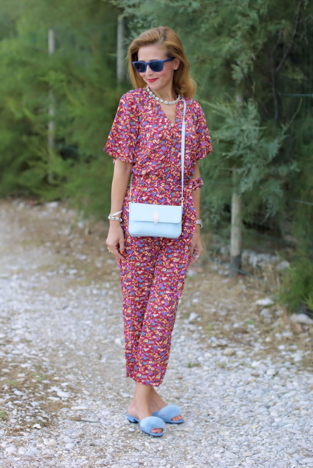 Floral jumpsuit and baby blue furry slippers on Fashion and Cookies fashion blog, fashion blogger style