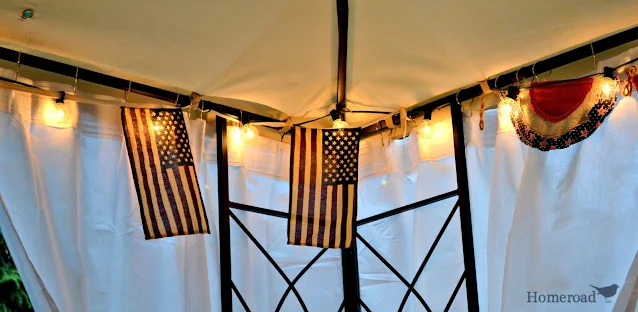 Flags and lights in outdoor canopy