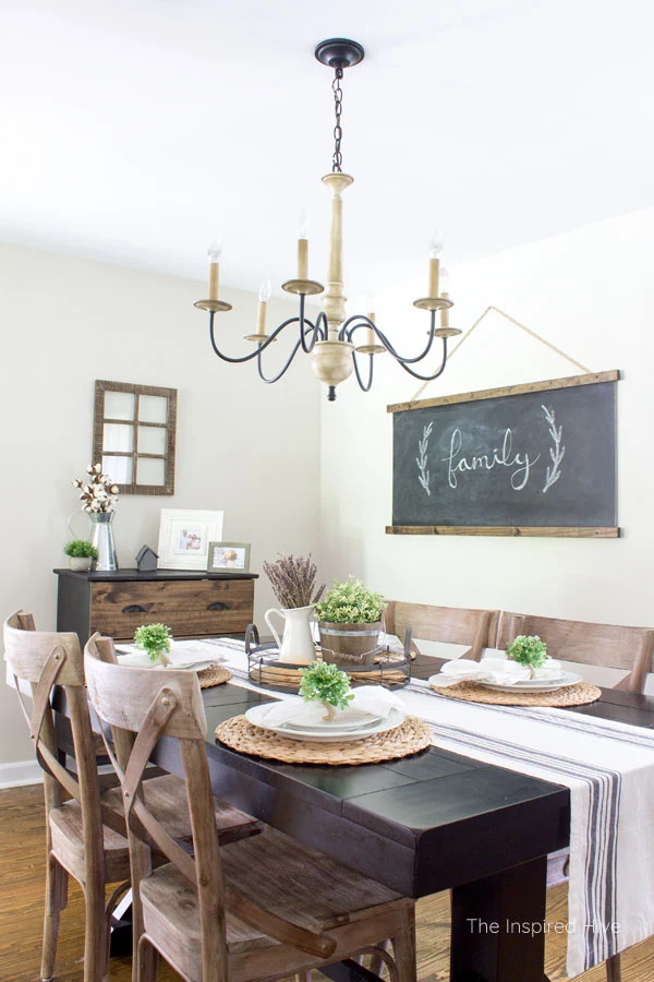 Dining room tour. See an update of our modern farmhouse style dining room. High contrast wood and black decor with touches of cottage charm.