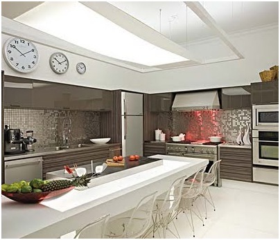 MODERN SILVER KITCHEN WITH ISLAND AND WHITE TABLE