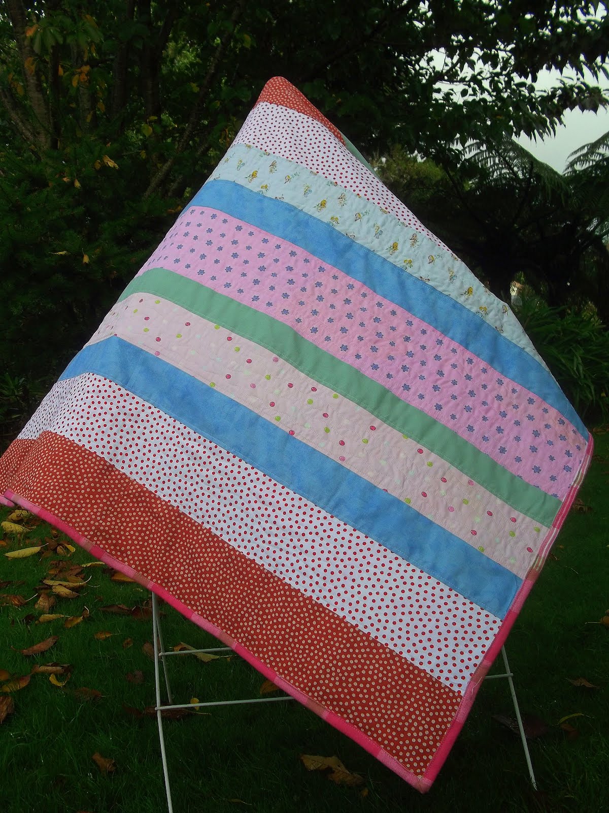 CREATIVE TEASE STRIPED BABY BLANKET WITH WAVY QUILTING
