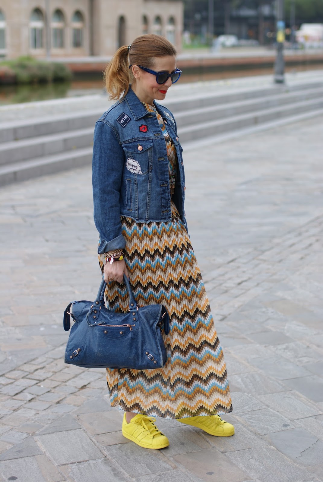 Pleated maxi dress and denim patched jacket on Fashion and Cookies fashion blog, fashion blogger style