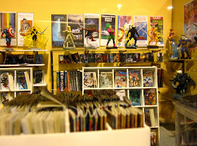 Interior view of a modern dolls' house miniature comic book shop