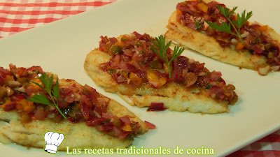 Merluza con verduras y salsa de limón