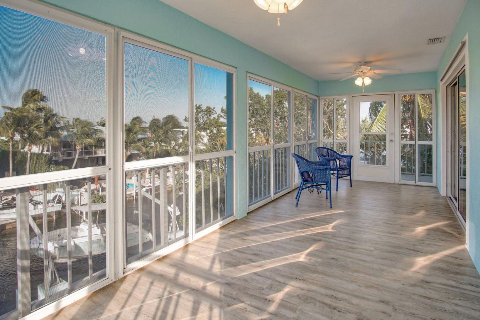 Real Estate in the Florida Keys 3/3 Concrete canal front in Key Largo 830K