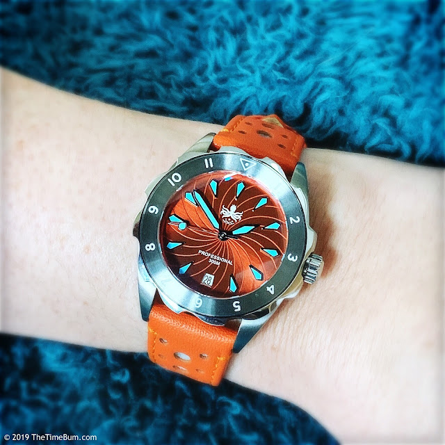 Phoibos Sea Nymph orange wrist shot woman