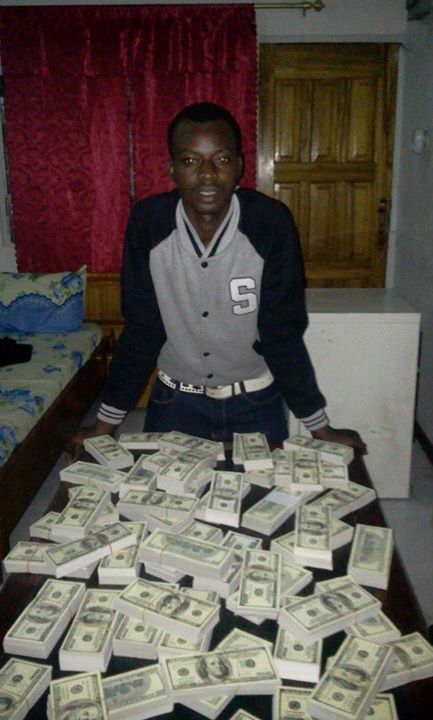 PHOTOS: Boy Flaunts Pictures of Foreign Currencies And Those Of Him Inside A Shrine On Facebook, Calls It Bastard Money 13