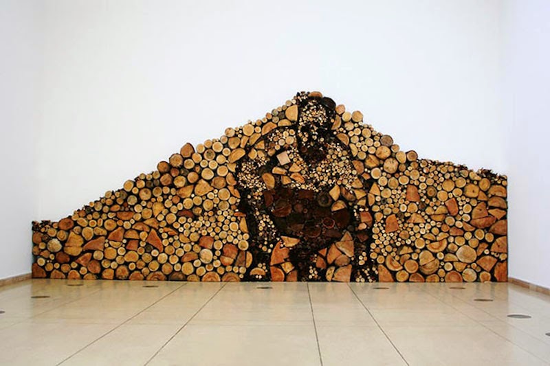 Man Made Of Wood Pile - These People Turned Log Piling Into An Art Form