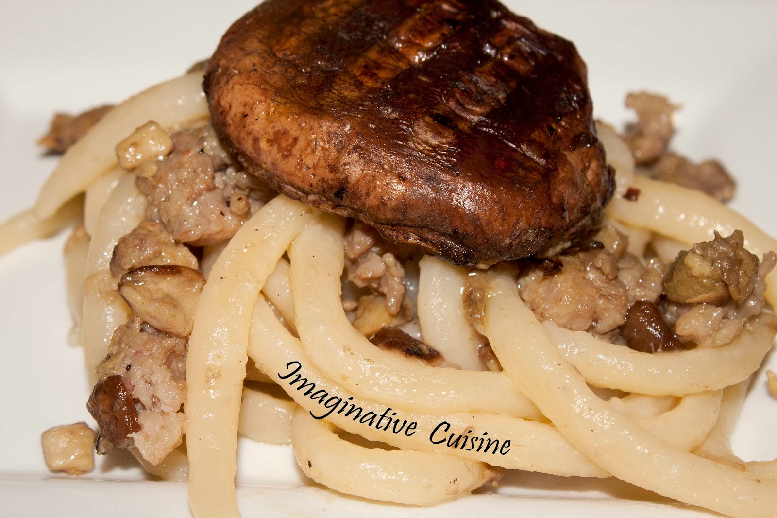 Imaginative Cuisine Pici ai porcini e salsiccia