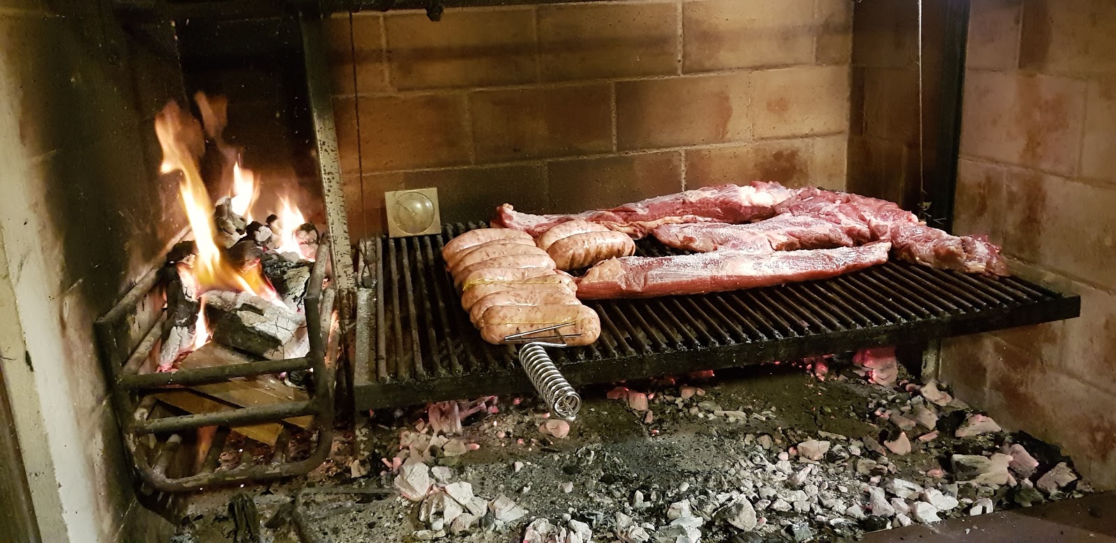 Parrilla fire and asado